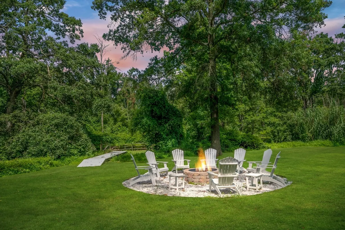 outdoor living with a circle of chairs in an open garden serving as a perfect place to relax in historic caves valley maryland home